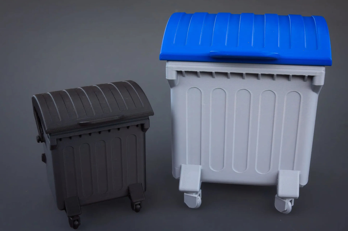 The swing-top dumpster desktop bin