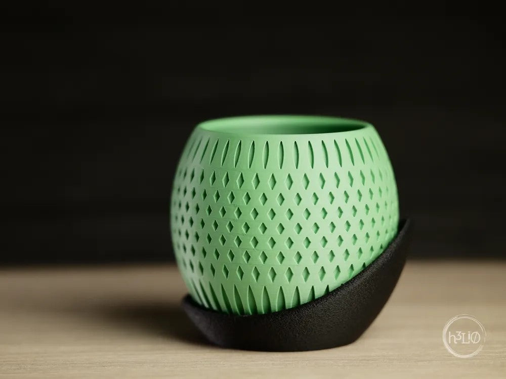orbit · planter with wrap around plate