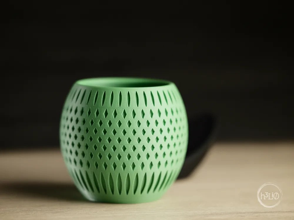 orbit · planter with wrap around plate
